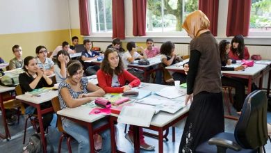 Belgian teacher Khadija wearing a headscarf in the classroom